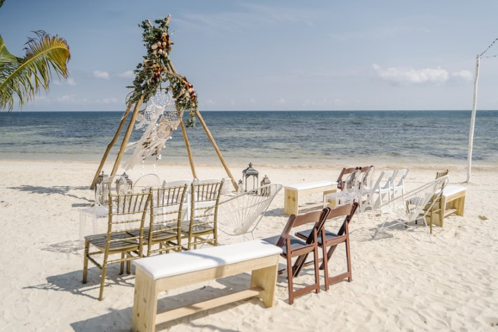 Beach wedding ceremony setup